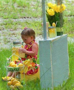 Little Girl at a Lemonade Stand Little Girl at a Lemonade Stand