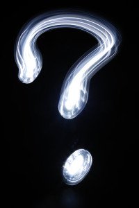 White Question Mark on Black Background