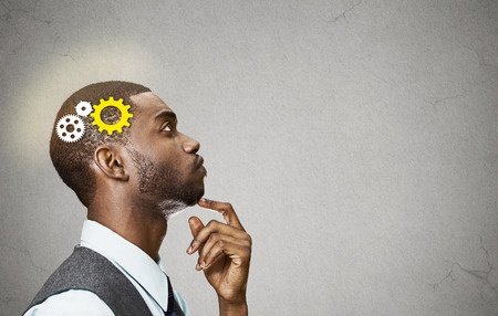 African American Man Thinking with Gears in His Head