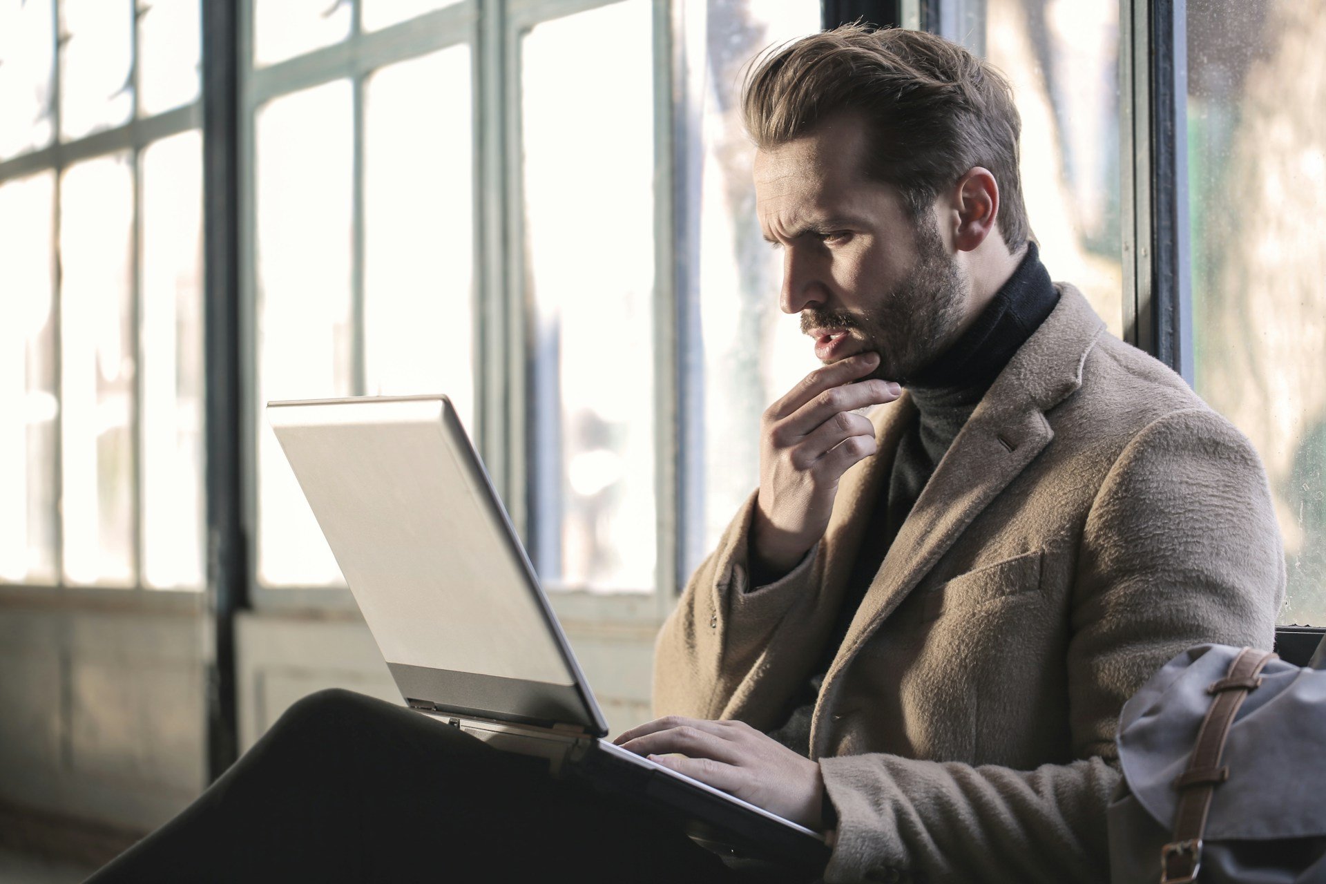 man using laptop