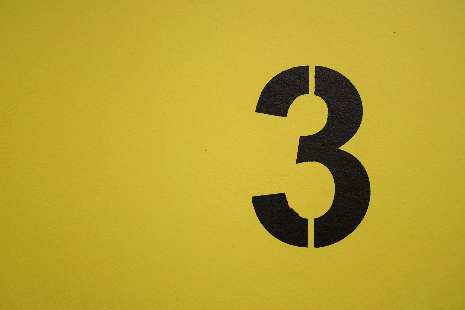number 3 yellow background
